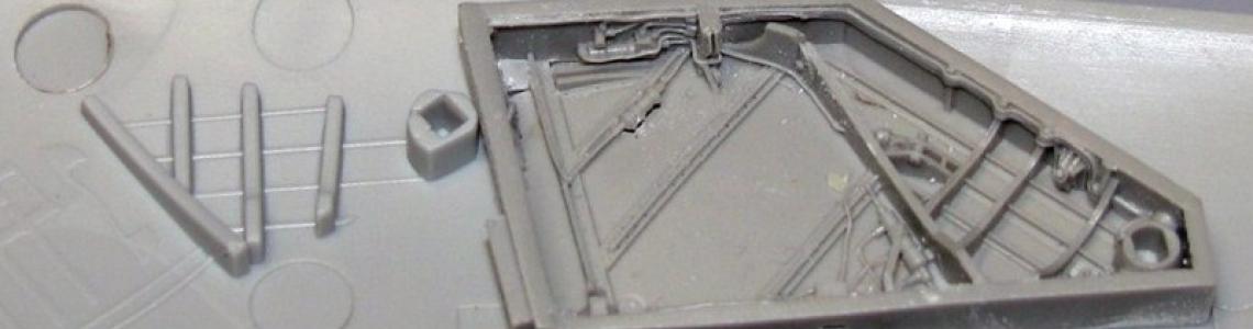 Aires parts held up next to kit items