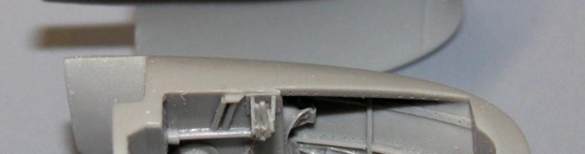 Aires parts held up next to kit items