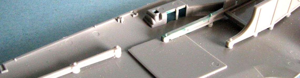 Lower wing stiffeners and gear bays