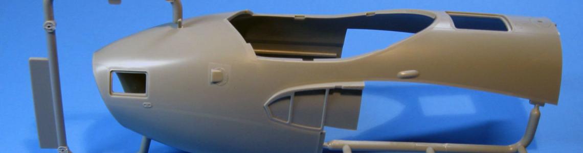 The forward section of the fuselage is a 1-piece molding with no seam lines.  The cockpit is a separate module that is assembled and inserted into the forward fuselage.