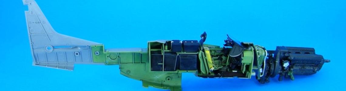 Engine/cockpit assemblies in port side of fuselage