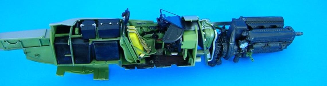 Engine/cockpit assemblies in port side of fuselage