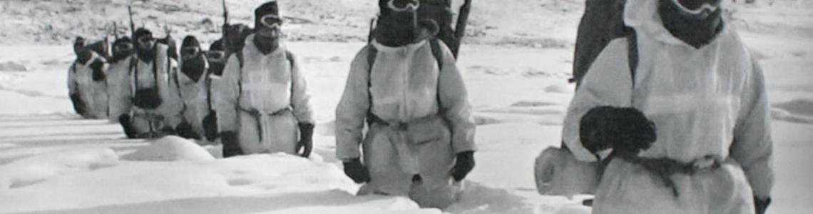Pakistani troops on patrol along the Line Of Control in thigh-deep snow.