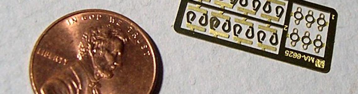 Photoetch fret compared to US one-cent coin