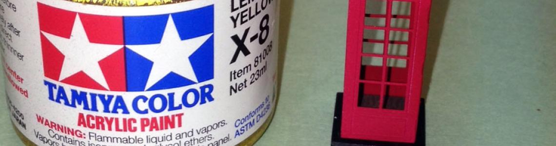 Completed and painted kit next to paint jar to provide scale