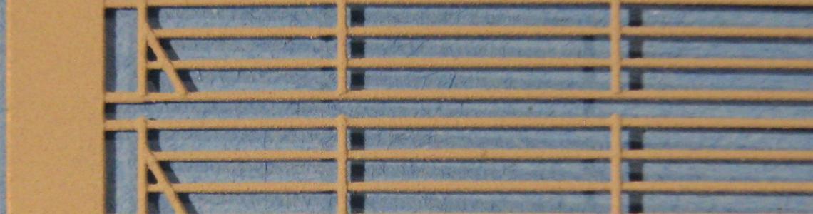 This is a closeup of the unprimed rails showing the stanchions standing out the rails.  The same relief is mirrored on the opposite side.