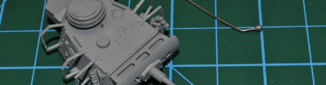 Nicely detailed turret with brackets for Schurzen. Note size of turret as compared to the size of a pin.
