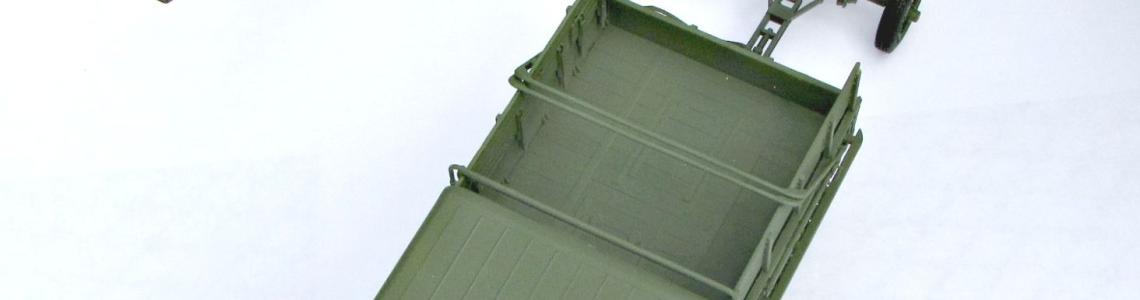 Prime mover with limber and howitzer