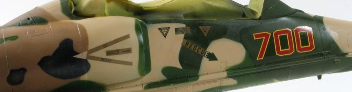 Dark tan portions of the markings should be in light tan