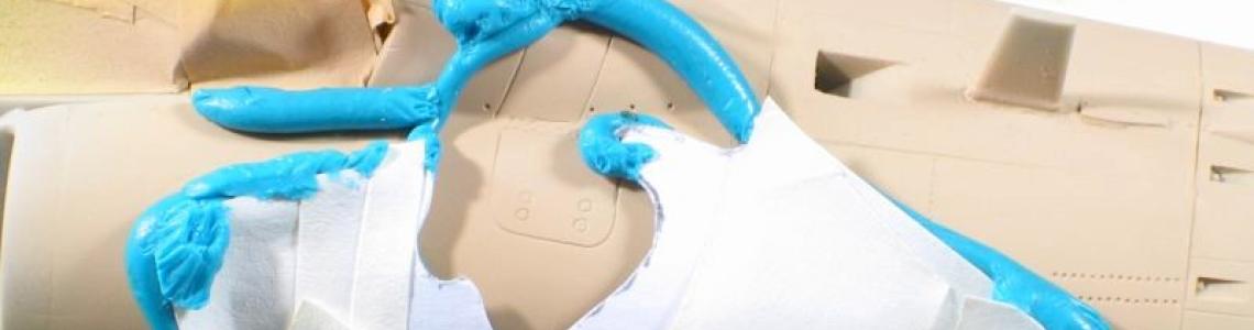 First round of masking using Blu-Tack and paper masks