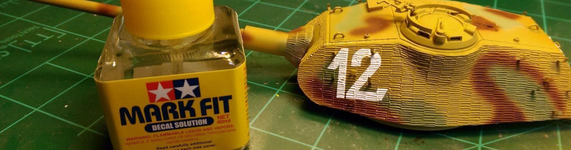 Decals being applied over Zimmerit, which settled down nicely due to use of Tamiya Mark Fit decal setting solution