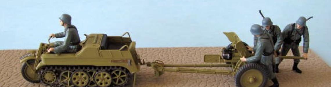 Completed vehicle and towed gun on base right side view