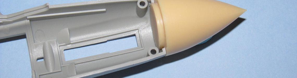 Resin-nose-to-plastic-fuselage joint