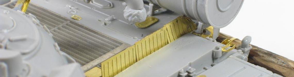 With the barrels installed, note how the baffle bends down