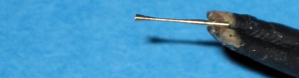 Part gripped in Pliers