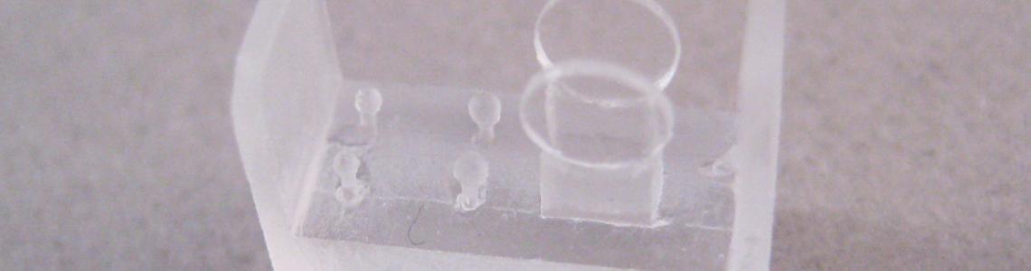 Picture of lenses and bulbs on clear sprue