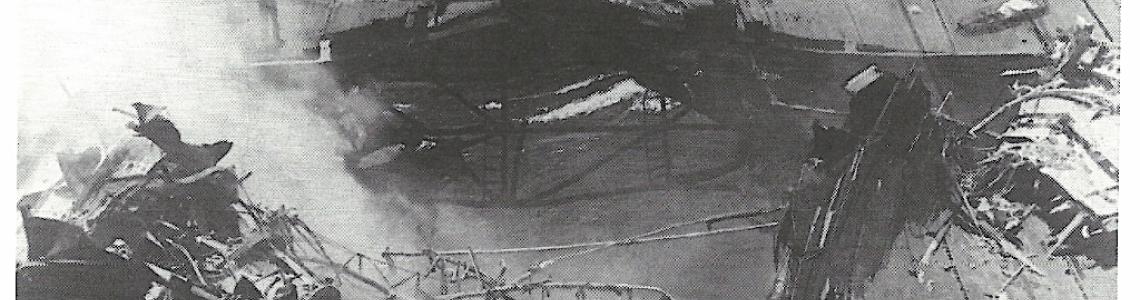 Damage to the wood flight deck of the USS Bunker Hill