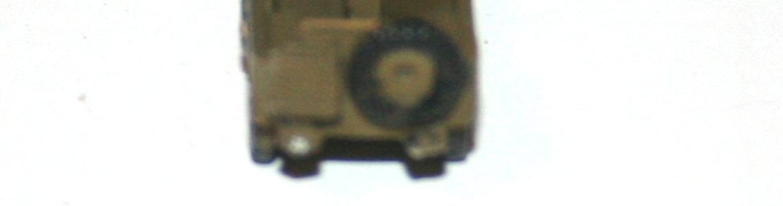 Jeep from rear showing spare tire