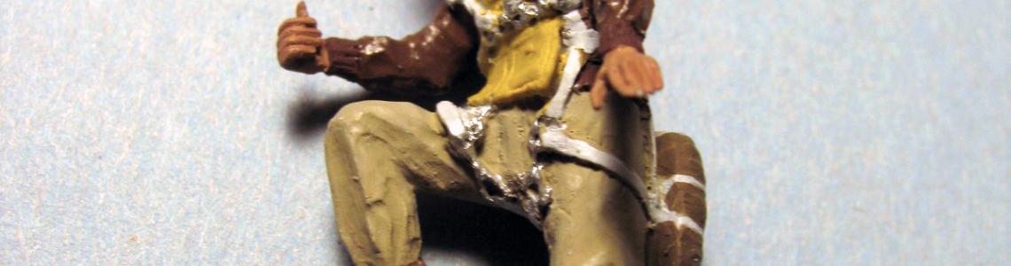 Figure with soft cap, side