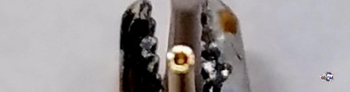 Muzzle opening on brass part