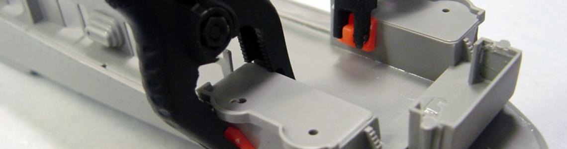 Clamping hull pieces for cementing