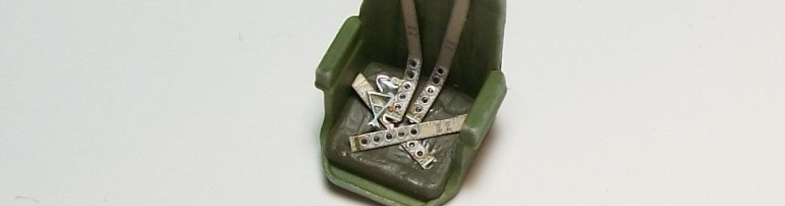 Eduard steel seat belt installed on kit seat.