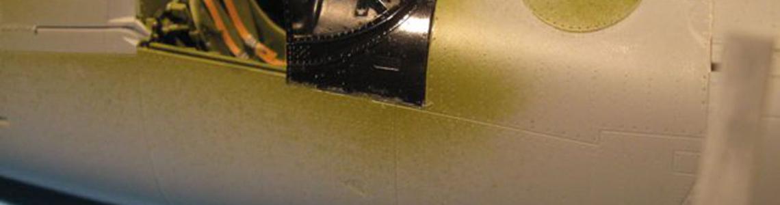 Note how the windscreen is molded into a larger clear part, allowing more effective seam filling with out damaging the clear panels.