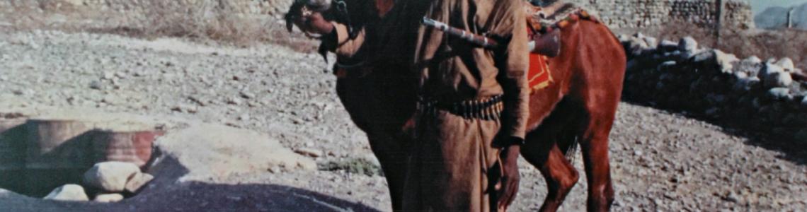 The Messenger for the Wali of Iski, a rebel area of Oman in 1963. Note the ancient rifle and bare feet, illustrating how impoverished the rebels were