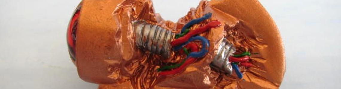 Creatures cranial internals showing added LED and wiring